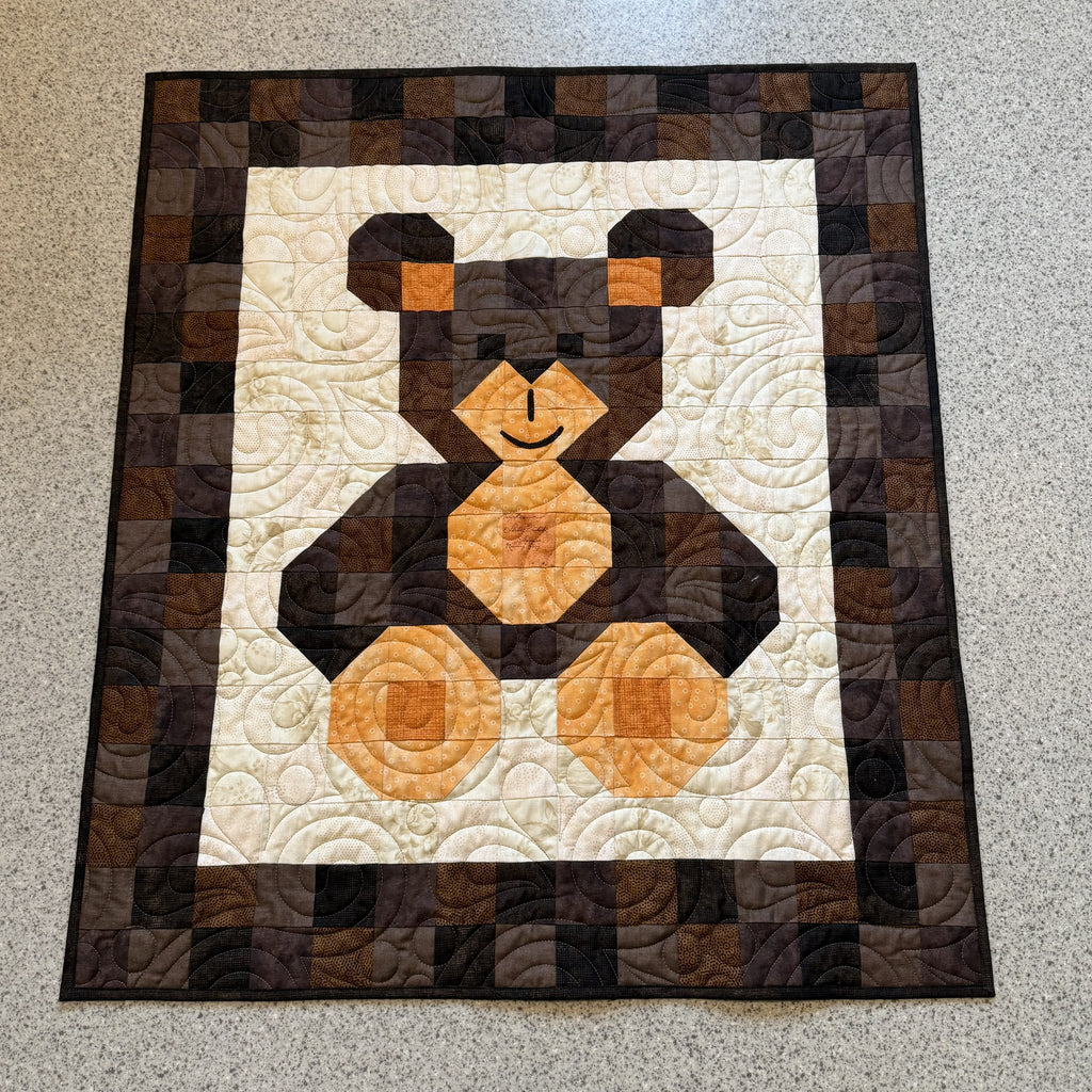 #461 Babyteppe brun/oransje bamse