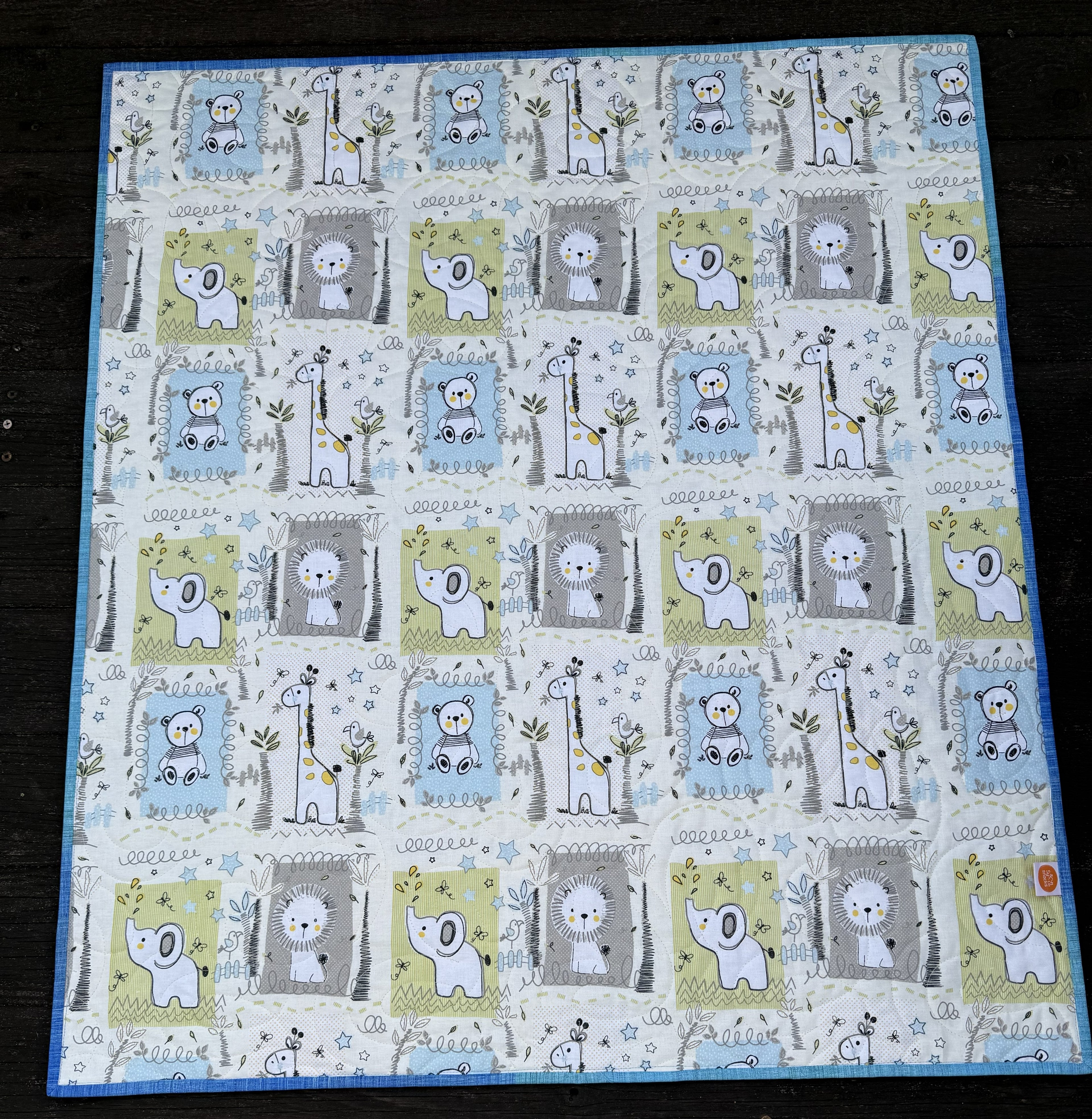 #477 Babyteppe turkis/blå/grønn bamse