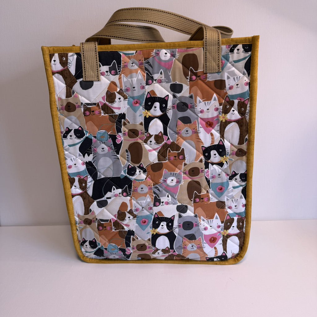Skulderveske Packed Cats i turkis og beige