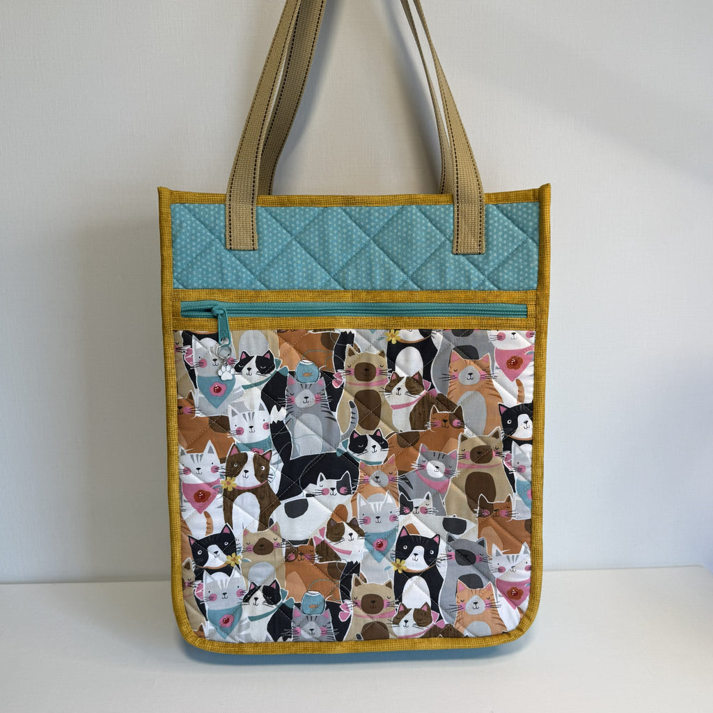 Skulderveske Packed Cats i turkis og beige